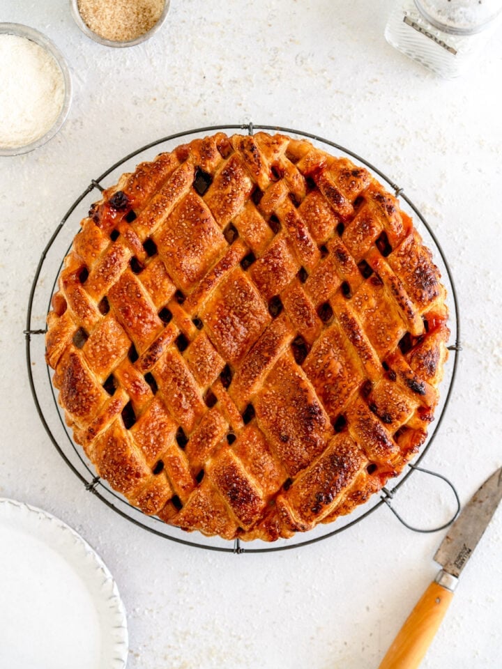 baked rhubarb pie on wire rack
