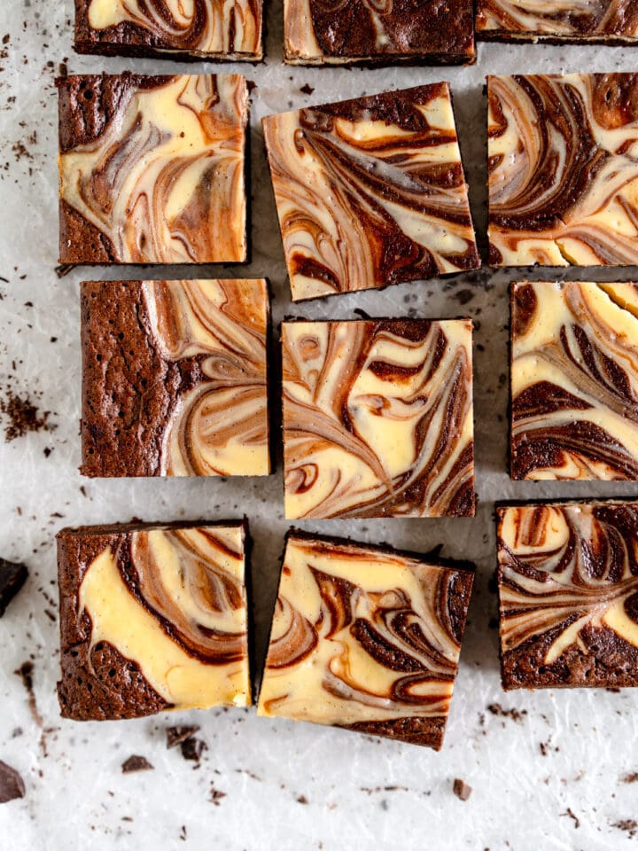 cheesecake brownies on wax paper