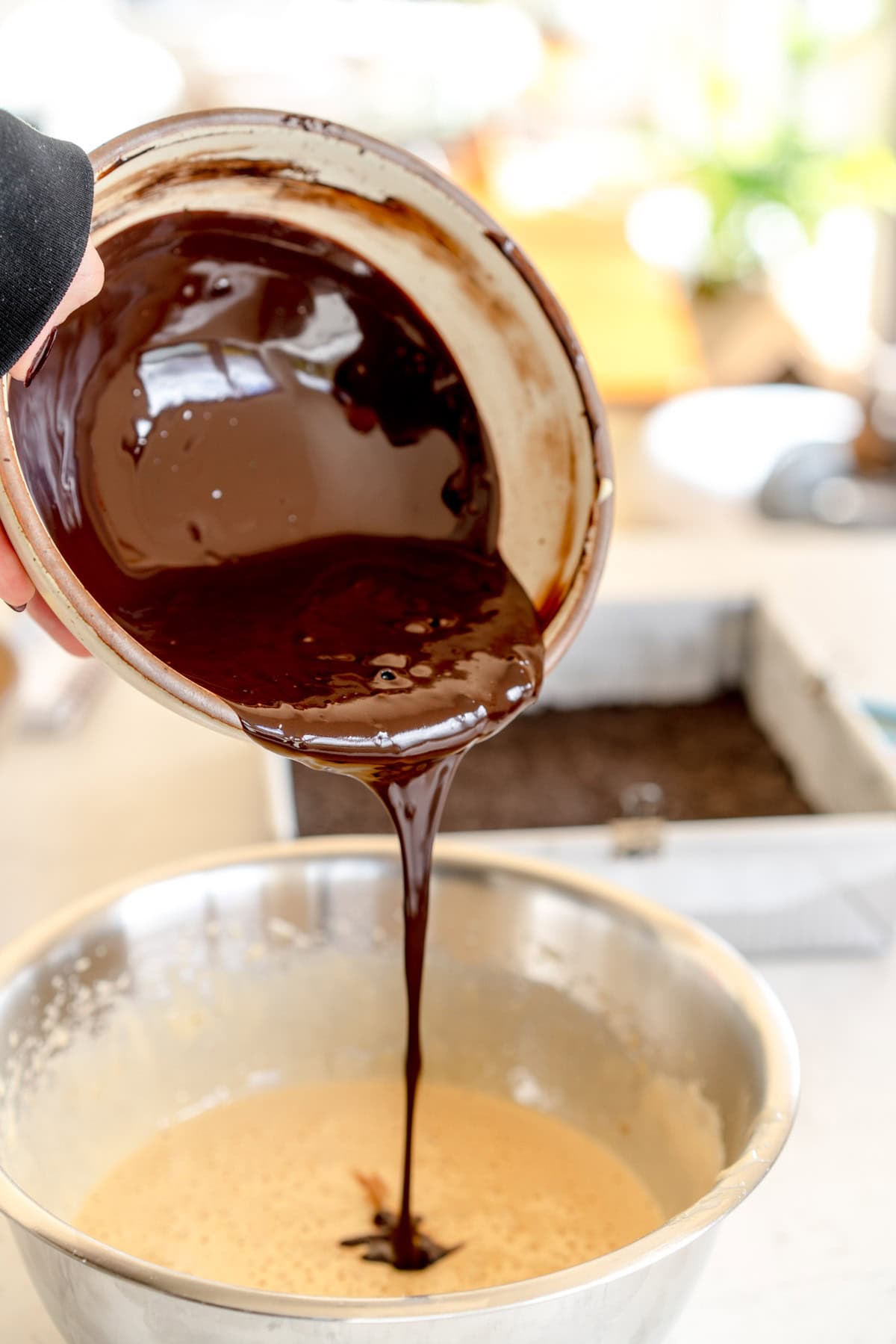 chocolate going into brownie batter