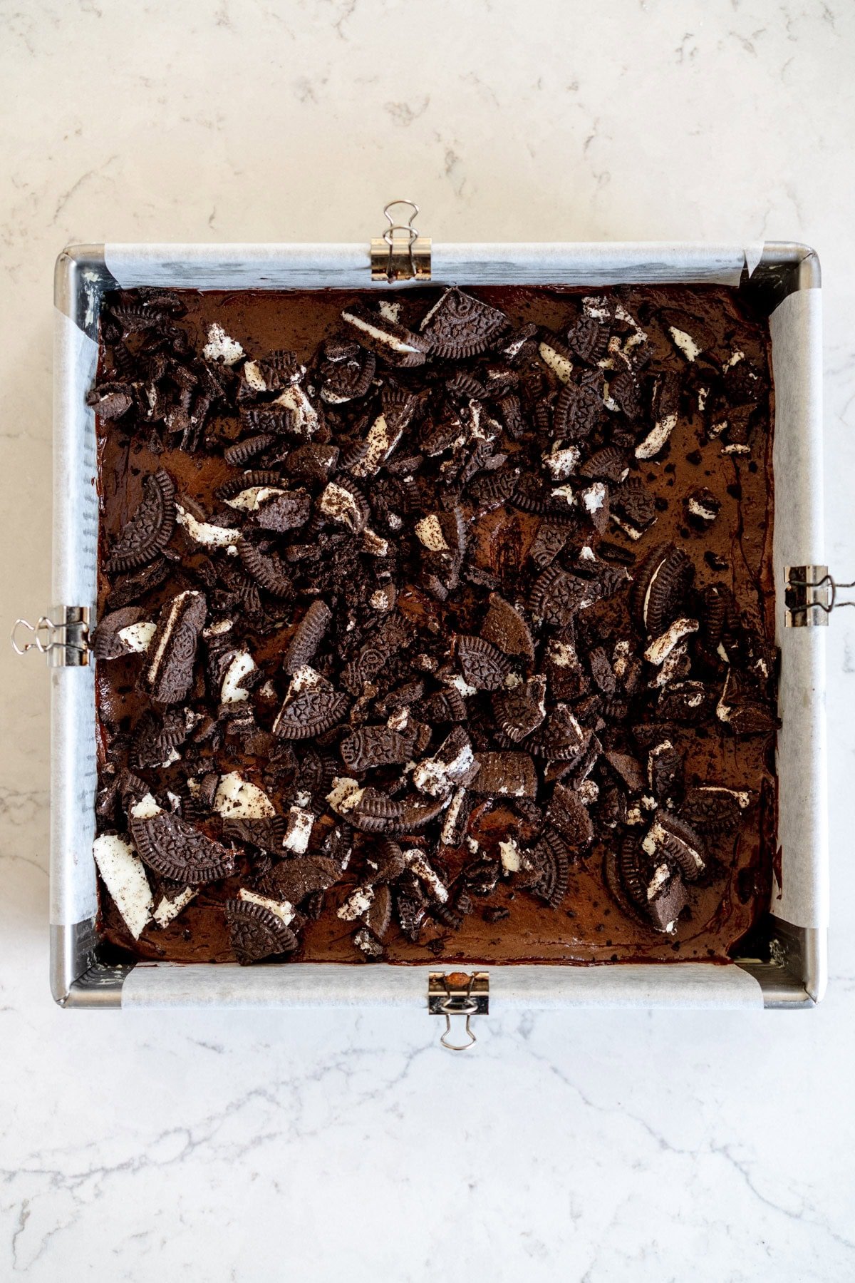 oreos on top of brownie ready for the oven
