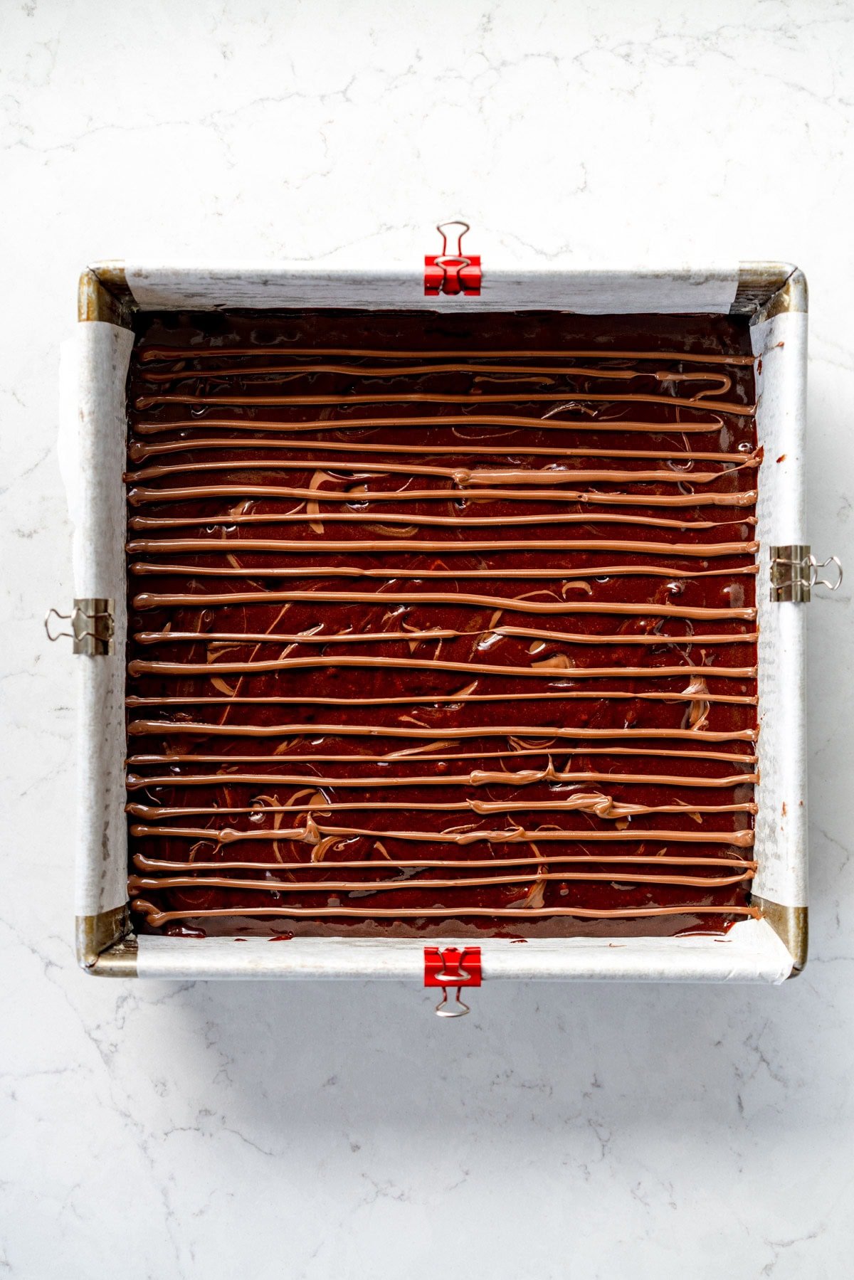 lines of nutella on brownie