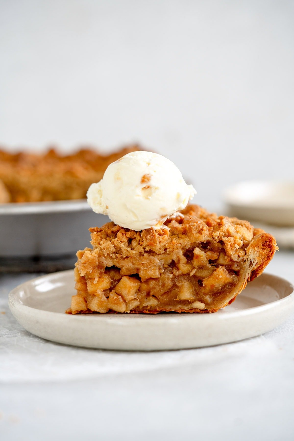 dutch apple pie with ice cream on top