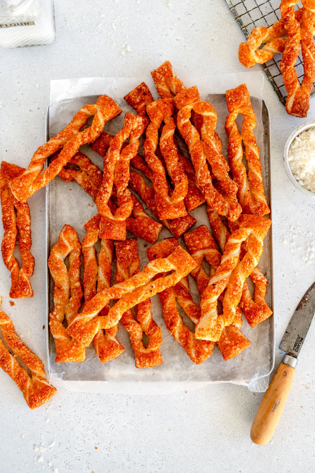 baked cheese straws on sheet pan