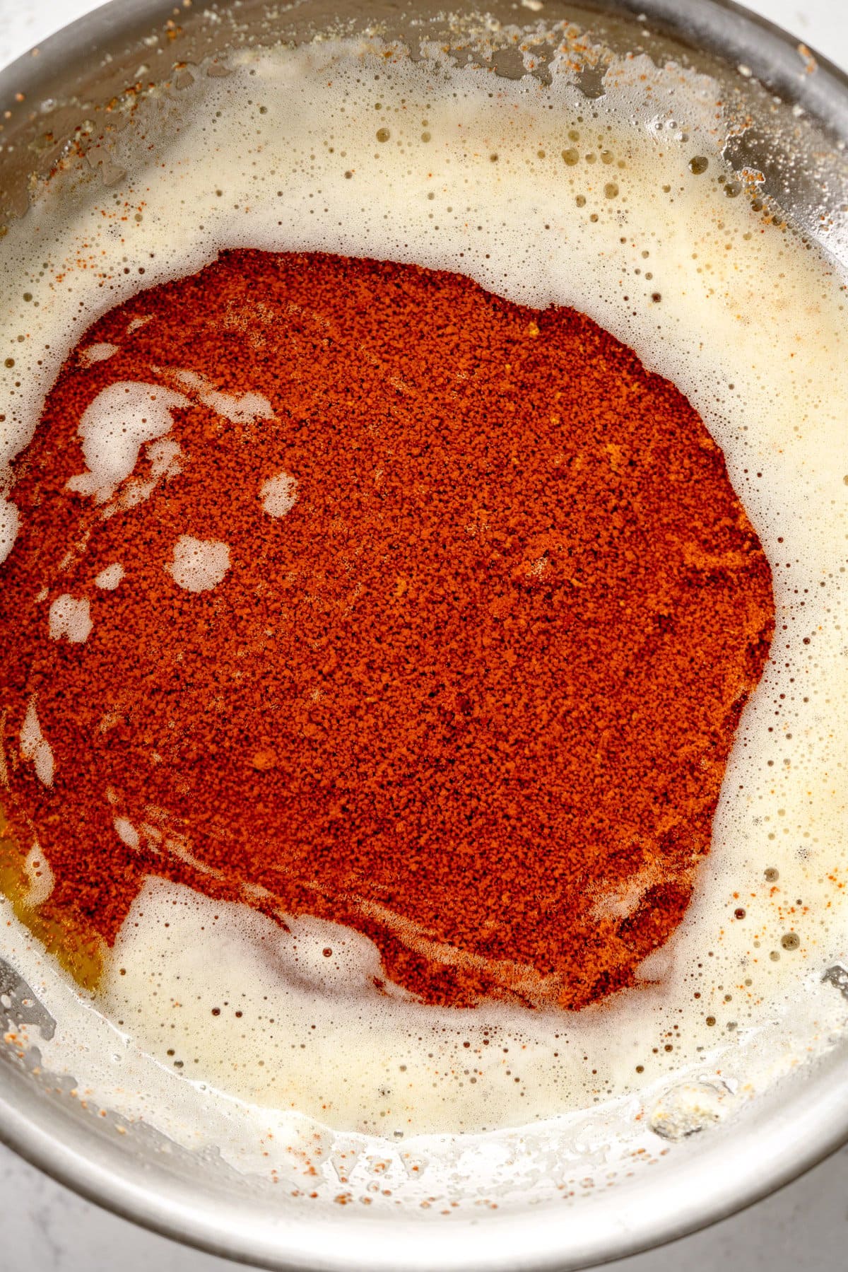 close up of brown butter with milk solids