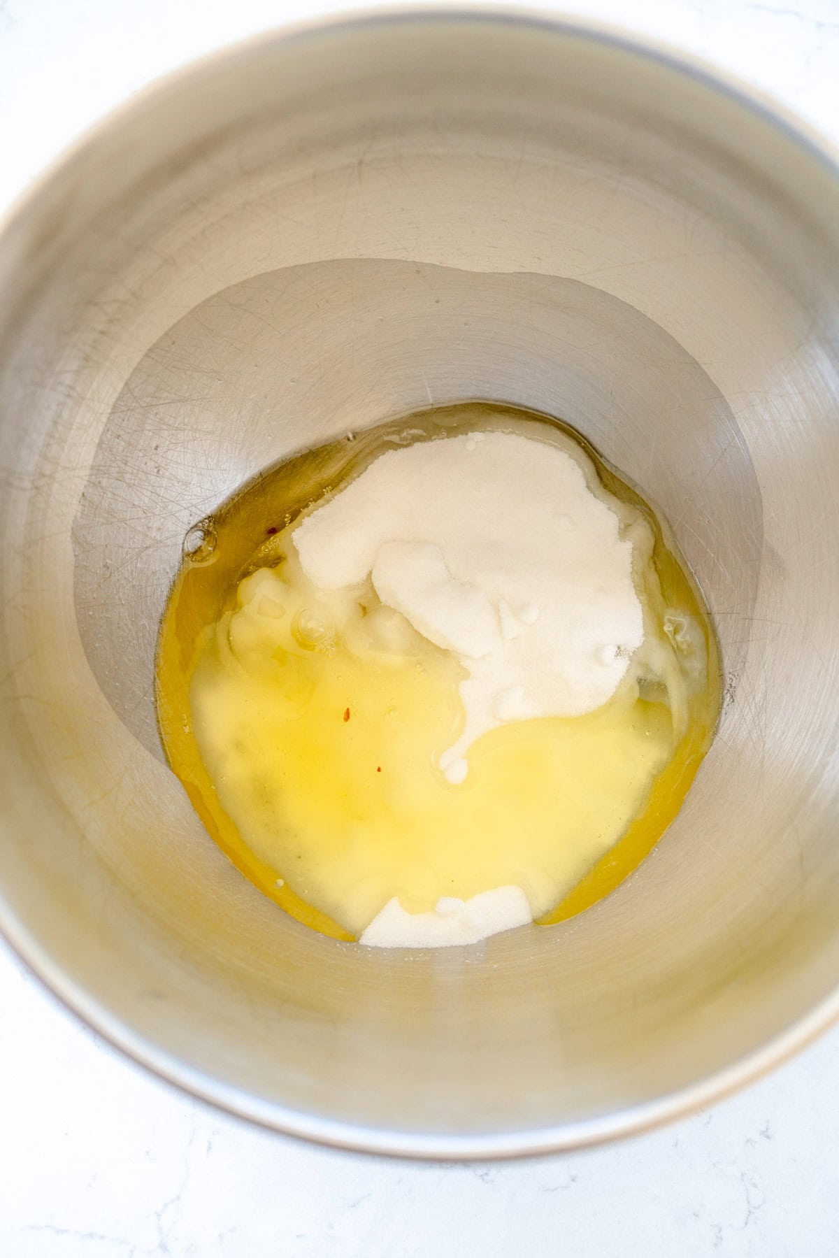 egg whites and sugar in mixing bowl