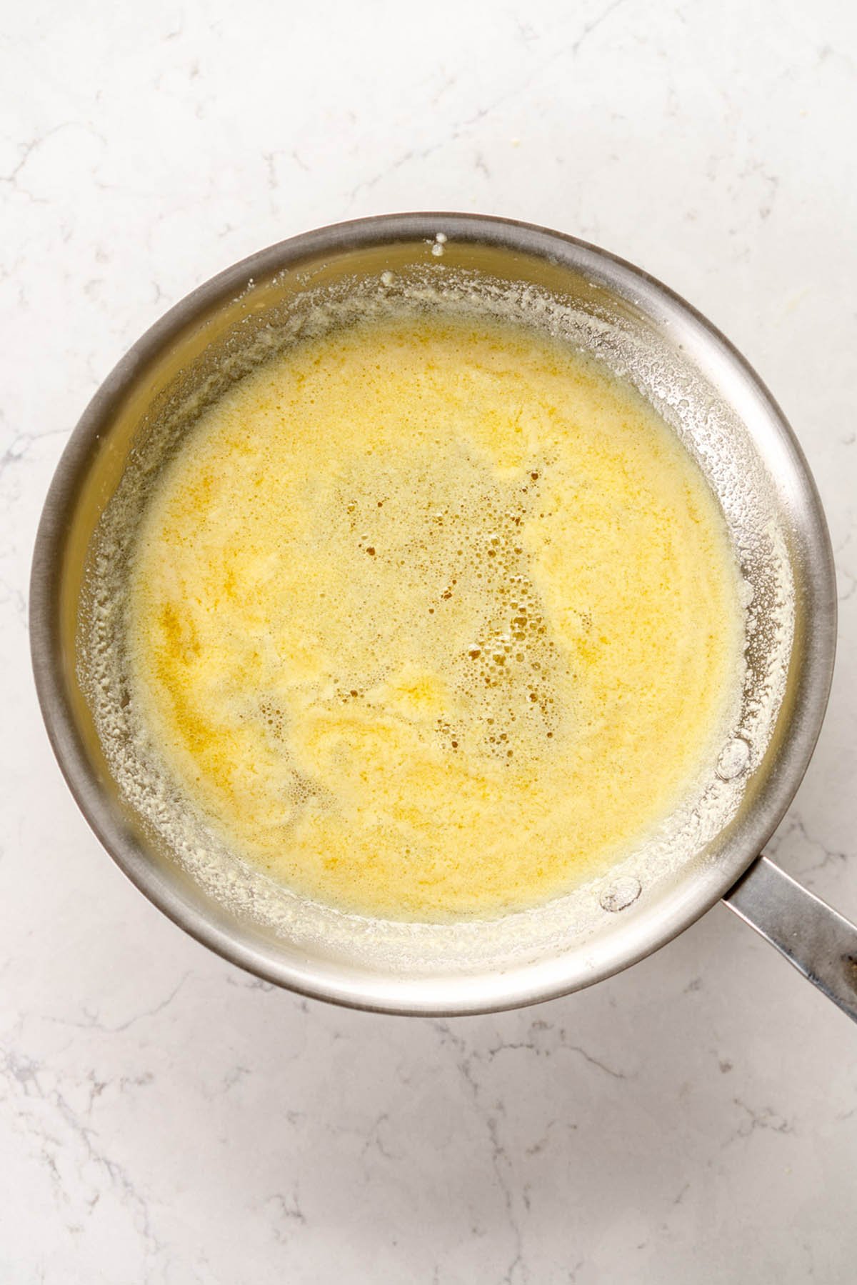 melted butter with milk powder added