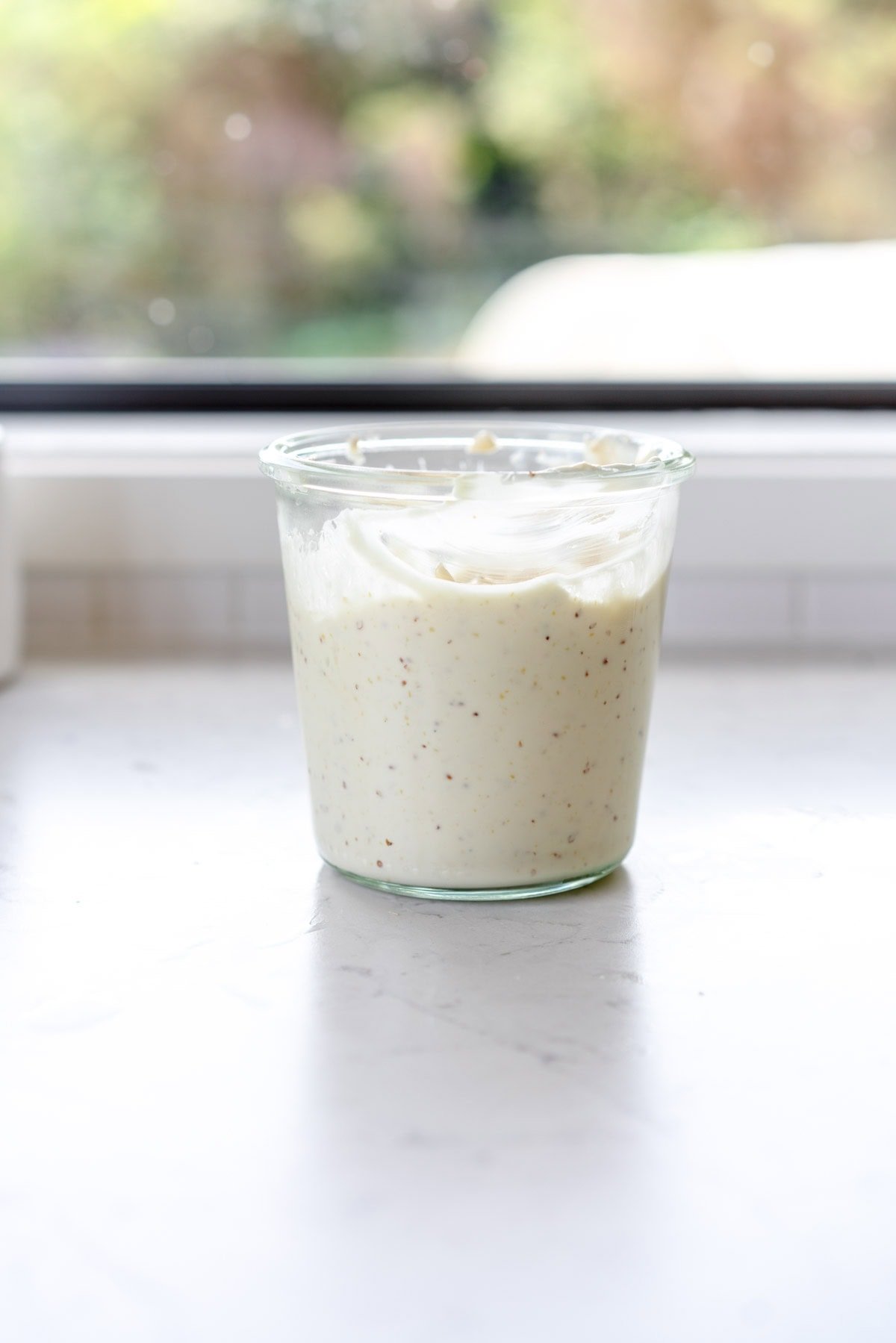 finished aioli in jar