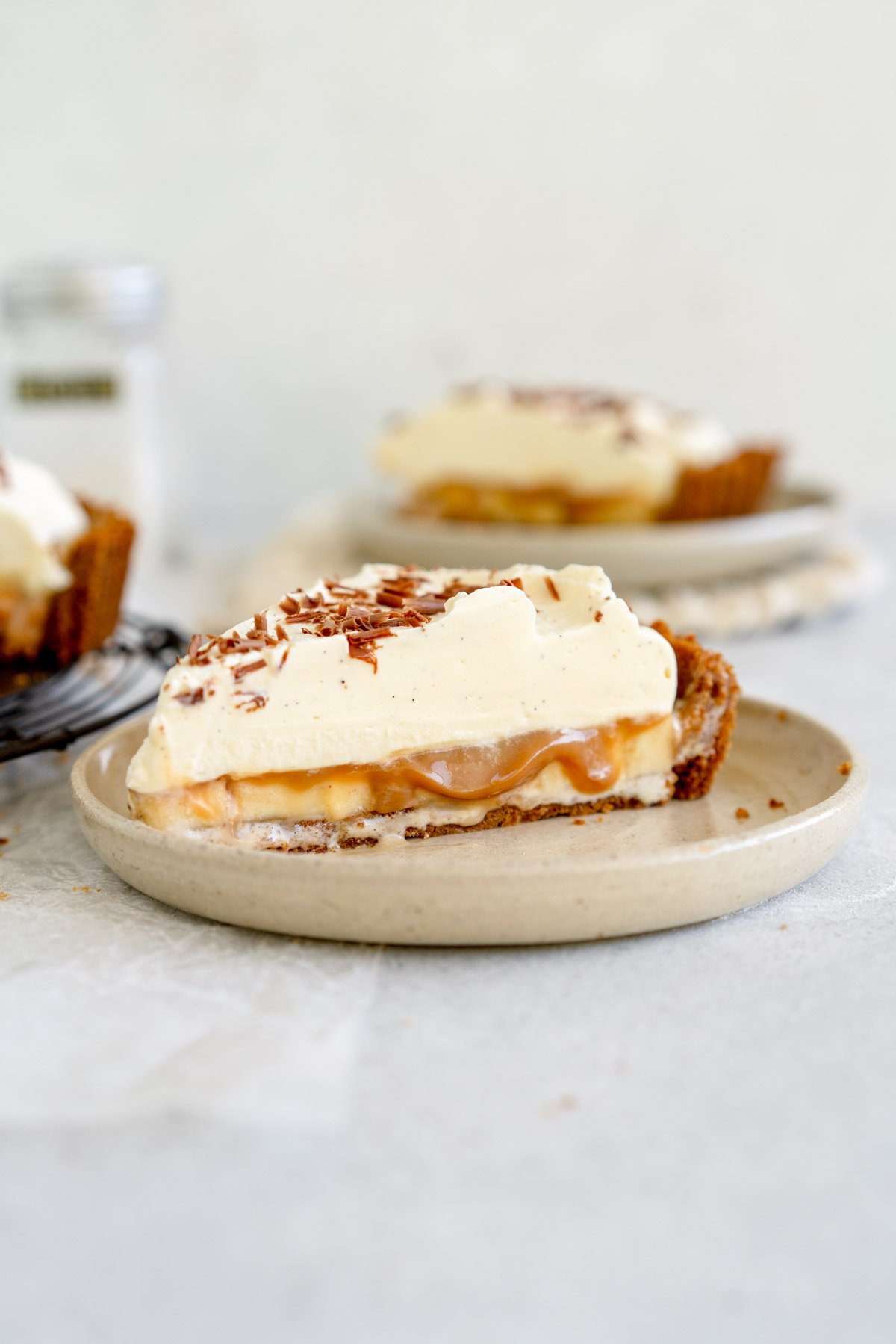 sliced piece of banoffee pie with caramel