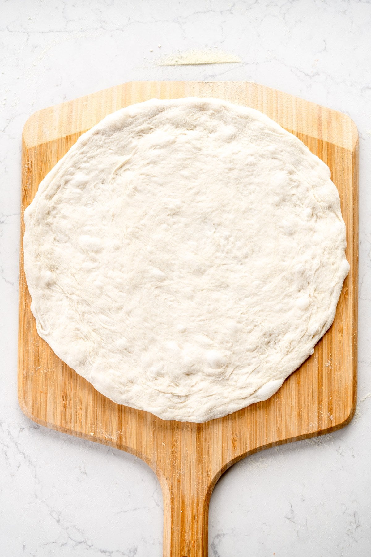 stretched pizza dough