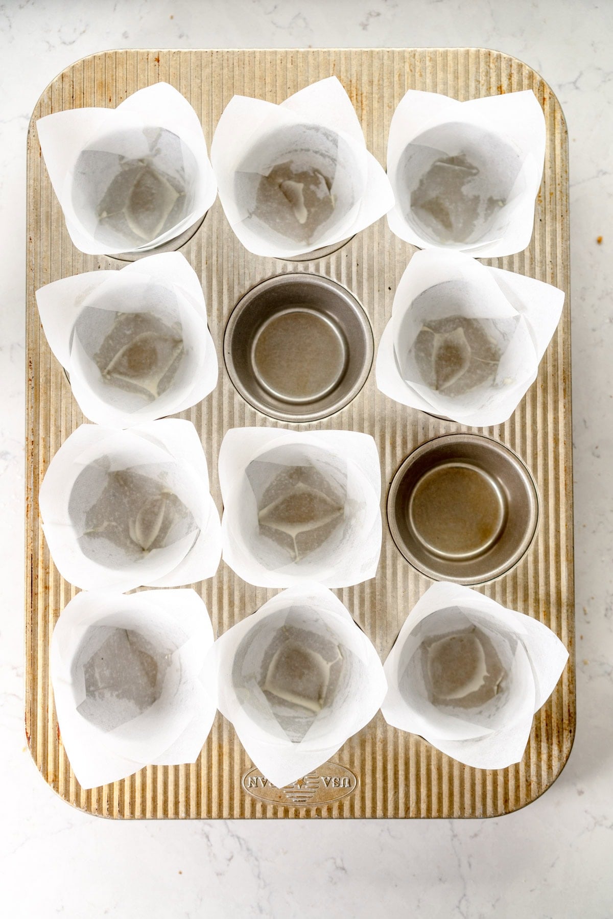 paper muffin cups in pan