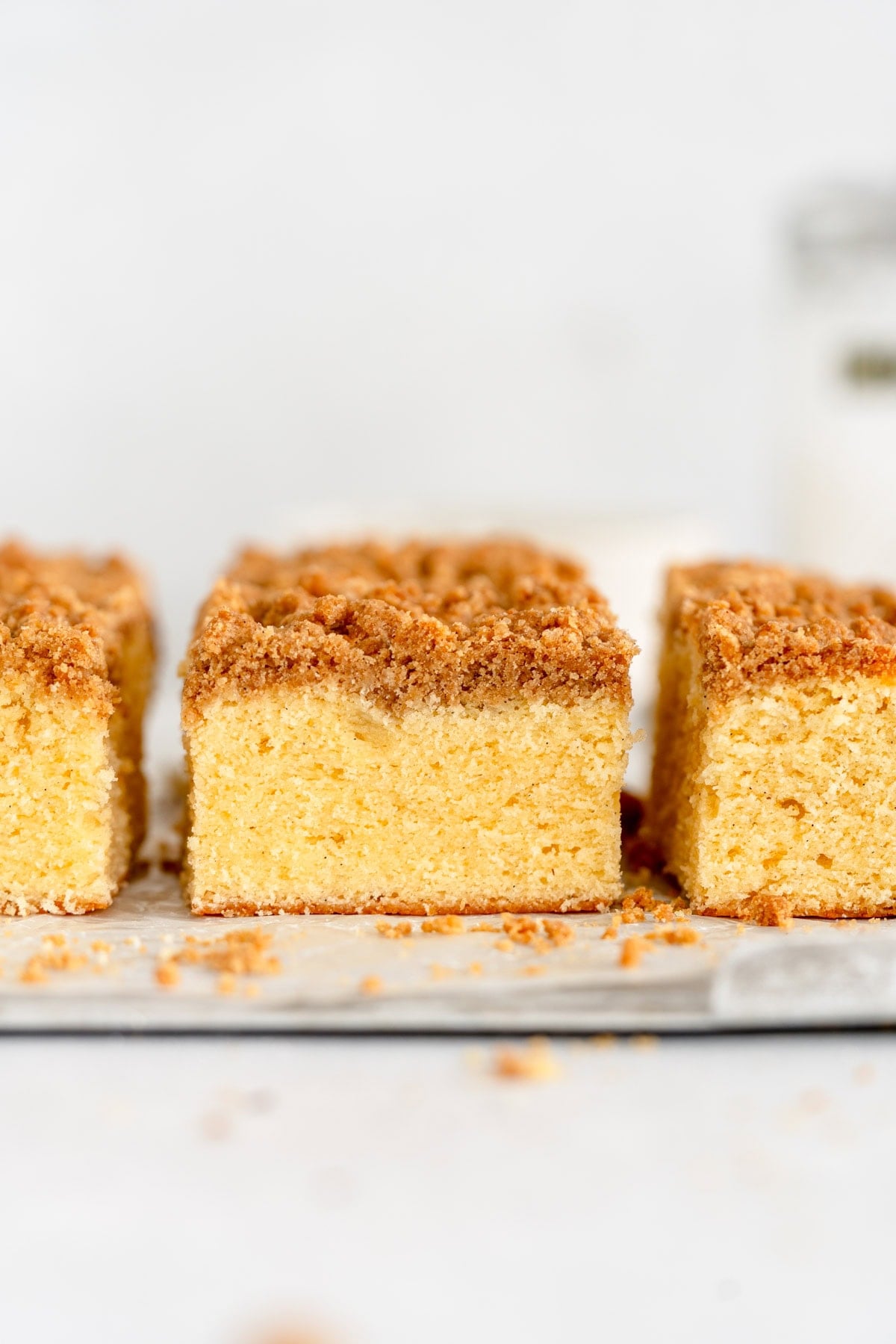 side on shot of cake with streusel topping