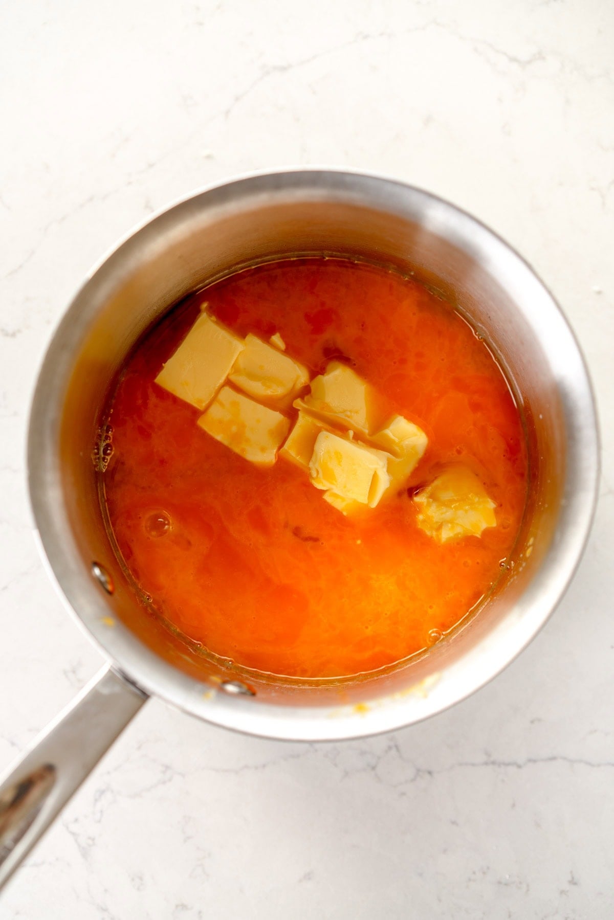 ingredients for lemon curd in pan