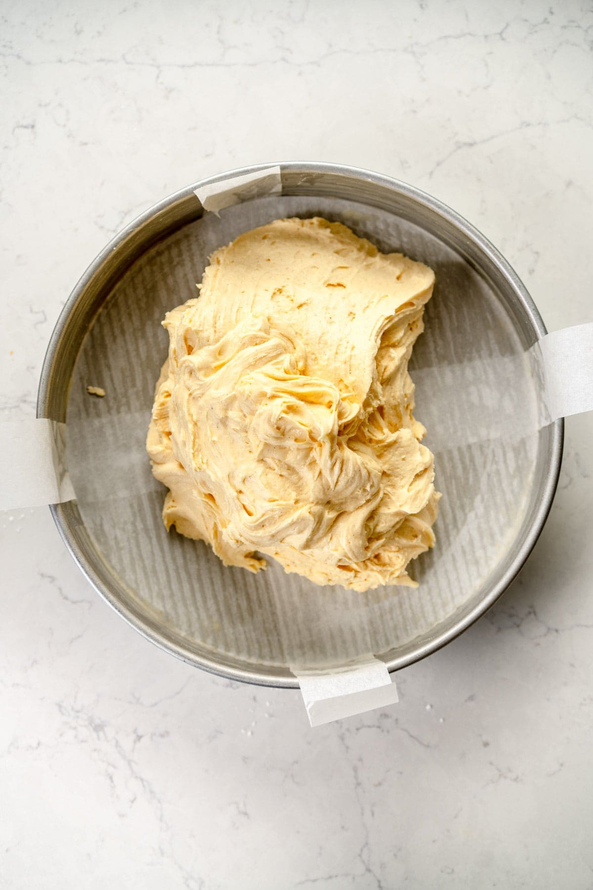 add cake batter to pan