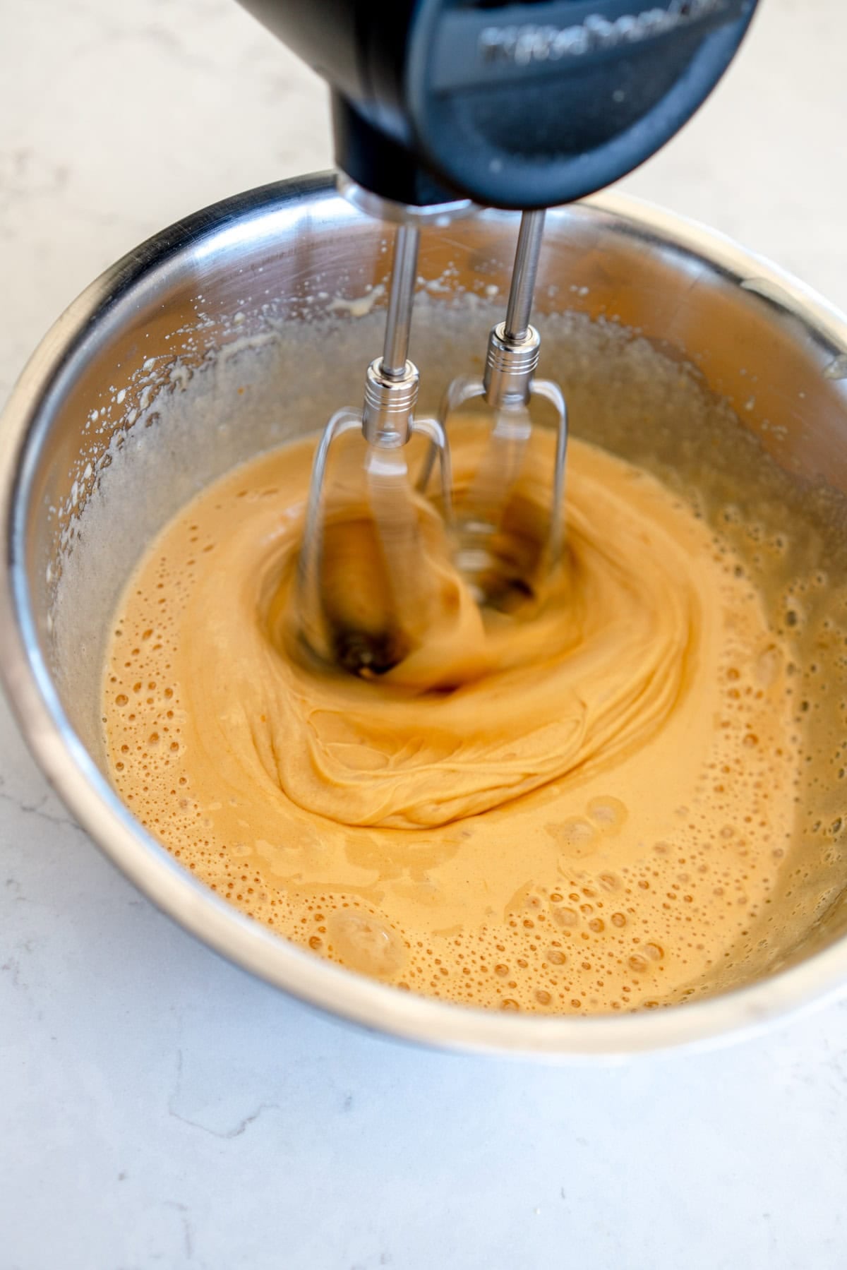 whipping up sugar and flour