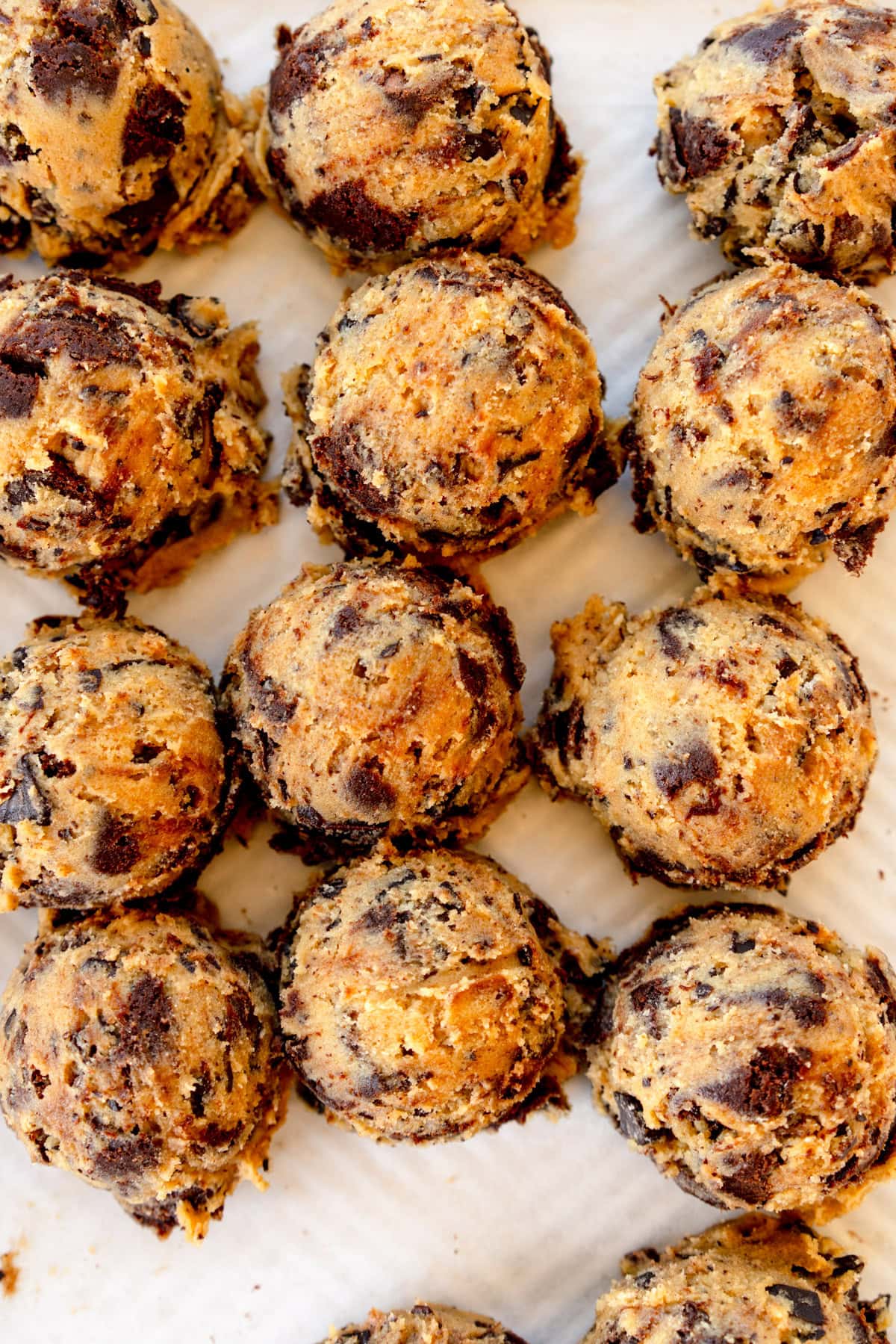 balls of cookie dough on sheet pan