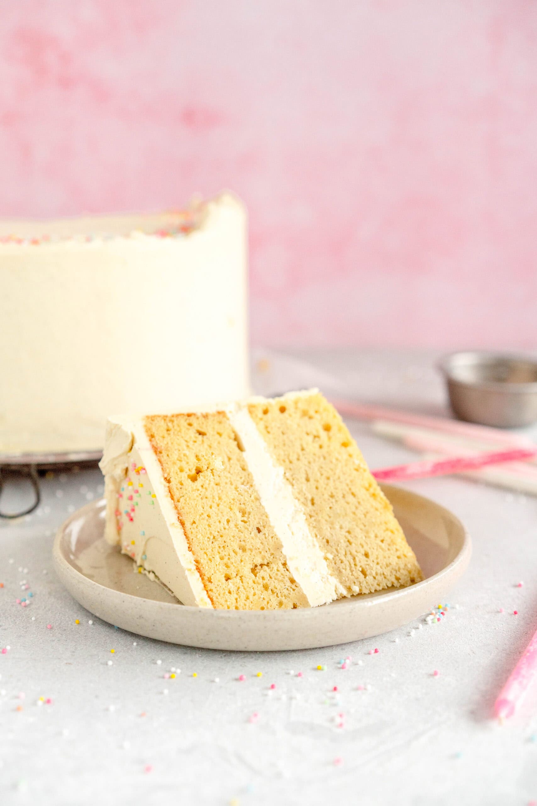 side shot of vanilla cake on a plate